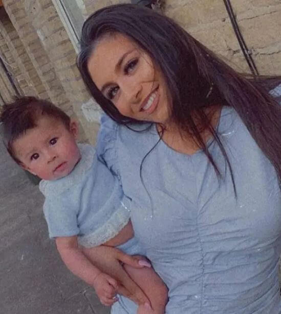 Tricia Brannan Malik’s youngest daughter, Safaa, with her little daughter, Zaneyah.
